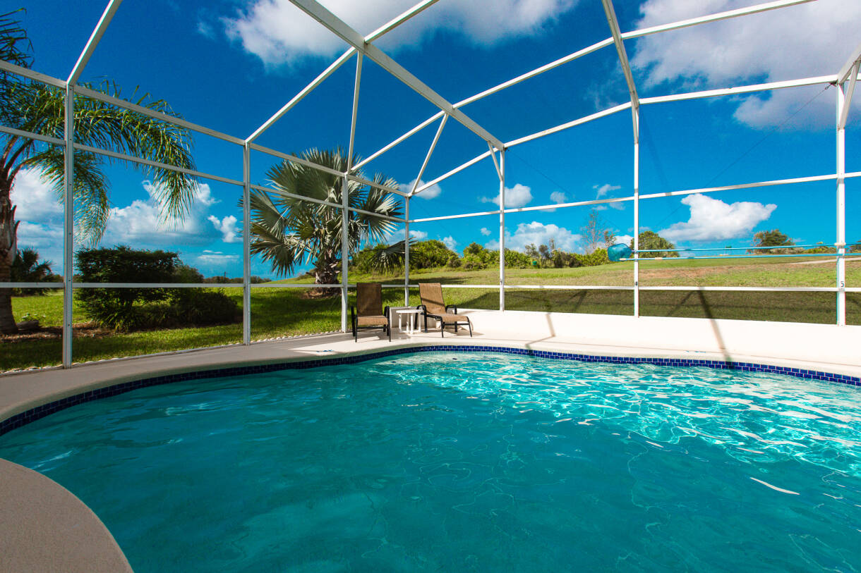 View of Stunning Renovated Villa Overlooking Golf Course - Prime Villa's ...