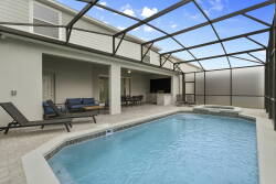 Step into a sunlit oasis featuring a refreshing pool surrounded by sleek lounge chairs, perfect for unwinding after a day of adventure. The modern canopy allows for outdoor enjoyment while providing a sense of privacy and comfort.