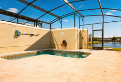 Welcome to your private oasis with a sparkling pool perfect for a refreshing dip. Bright walls and natural light create a relaxing atmosphere, while the tranquil view connects indoor comfort with outdoor charm. Enjoy your stay!