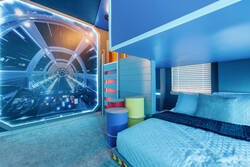 Rest in a futuristic space themed bedroom with a cozy bed, spaceship wall mural, soft LED lighting, colorful decor, and playful loft details, creating a fun space for kids during vacation.