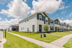 Discover the charm of this well-kept community, where fresh light-colored siding and lush landscaping create a welcoming atmosphere. Enjoy spacious pathways perfect for leisurely strolls to nearby amenities.