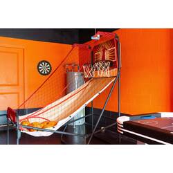 Have fun in a bold game room with a basketball arcade game, dart board, bright orange walls, black accents, sporty decor, and nearby air hockey for family entertainment.